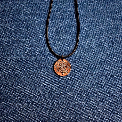 Spider Web Cut Penny Pendant
